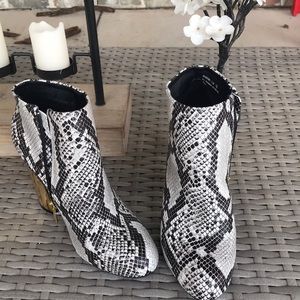 Never-been-worn snake-skin leather booties